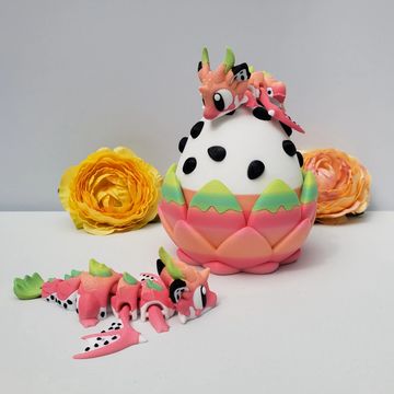 Pink and green dragonfruit mini dragon with matching fantasy egg and tropical inspired details.