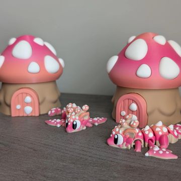 Pastel mushroom dragon with matching mushroom house and whimsical woodland fantasy decor.