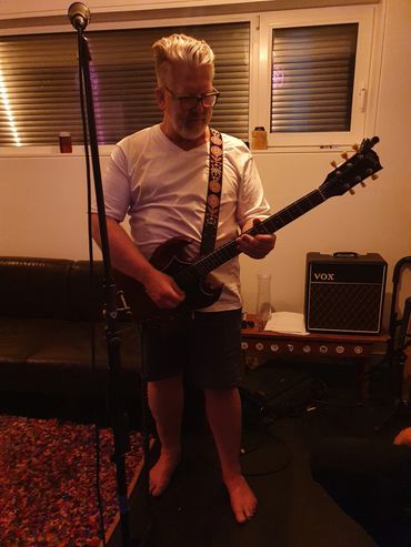 Eddie Bailey shredding on the electric guitar