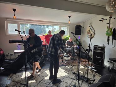 Eddie, Mike, Steve & Thomas setting up gear in the studio
