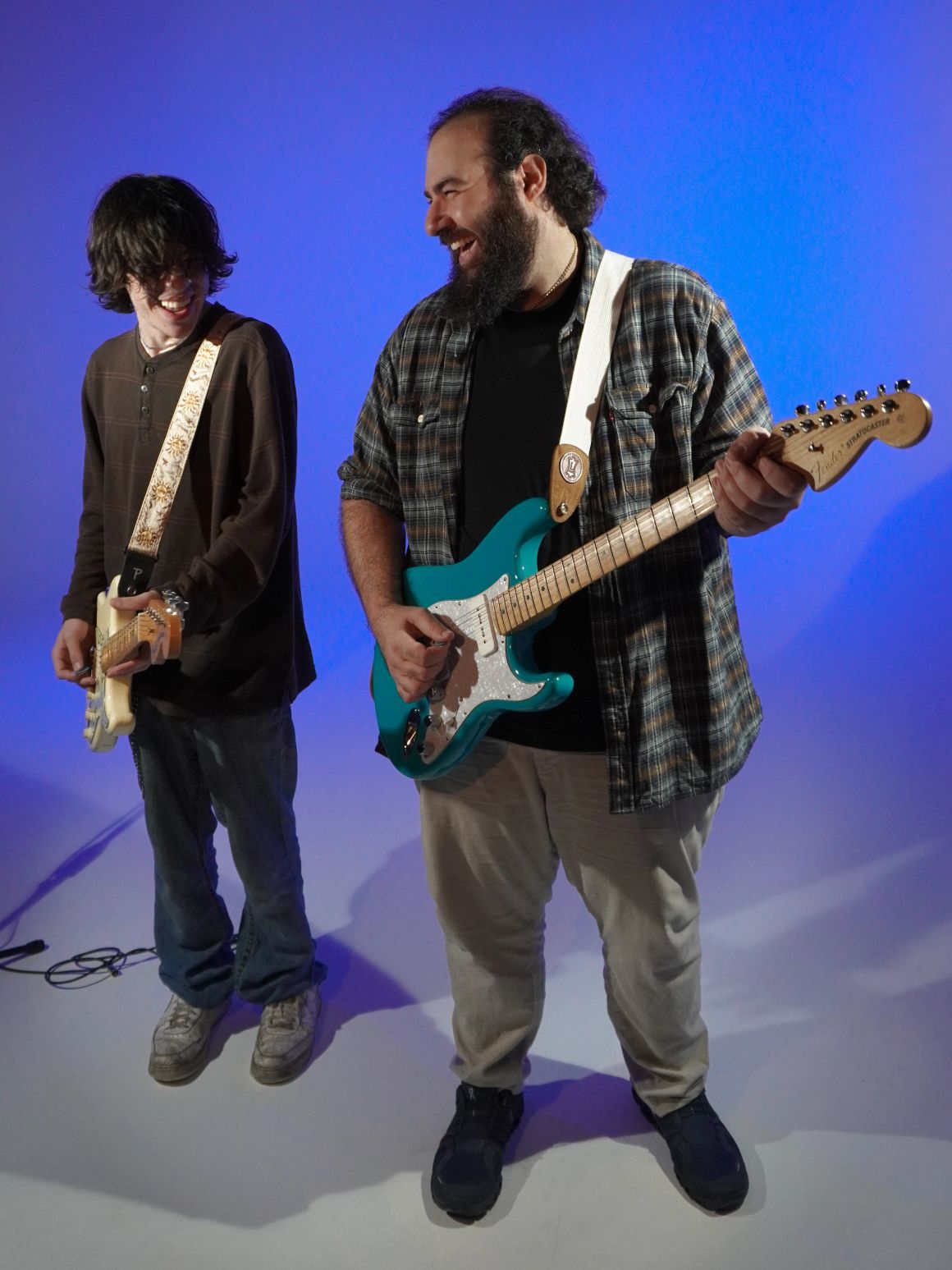 Nick Georghiou playing guitar with Costas Krasso