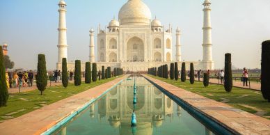 The Taj Mahal with its reflection in the water.