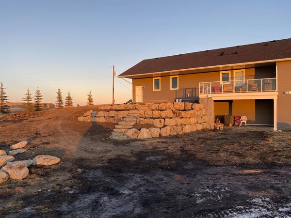 Tiered Sandstone Retaining Wall with Steps