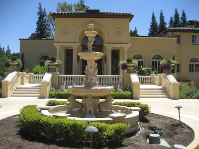 Fountain in front of house