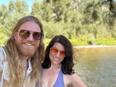 Mike and his wife at the river