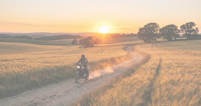 motorcycle riding from sunset
