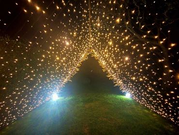 Large grand entrance fairy light tunnel arch for events setup - INSIDE VIEW.

BEST VIEWED ON DESKTOP