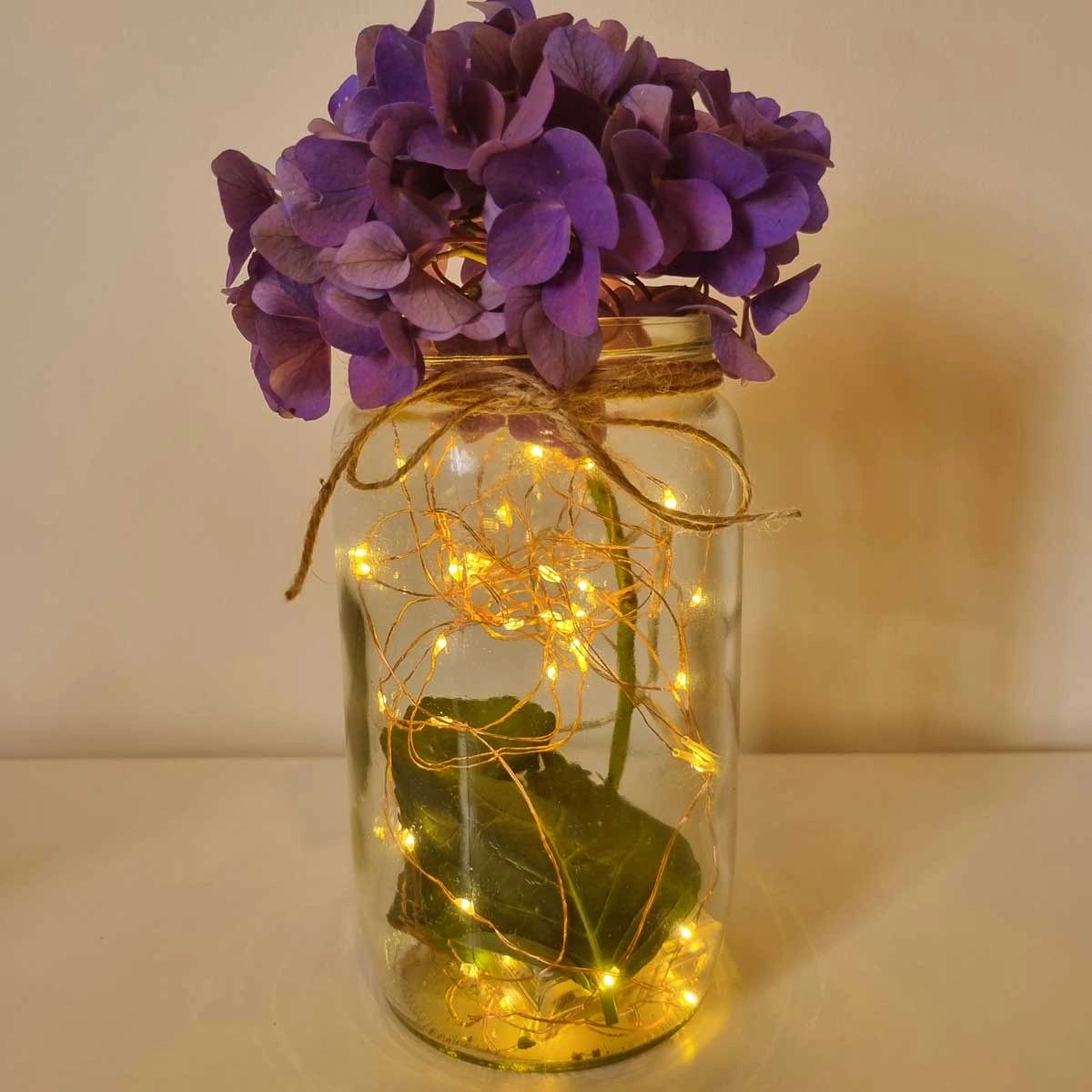 How To Make a Fairy Light Mason Jar Centerpiece with Flowers