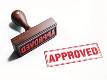 Rubber stamp with 'APPROVED' mark.