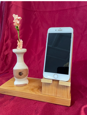 Cell phone holder with Twig Vase attached.