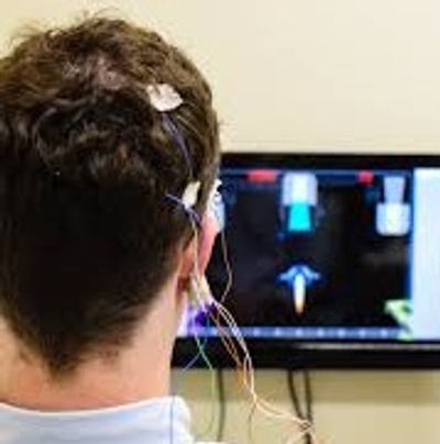 Young man receiving neurofeedback treatment 