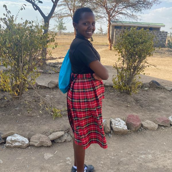 School girl with a kit 