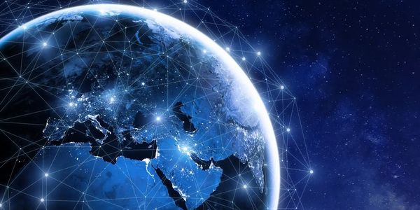 Digital network connections over Earth at night showing Europe and Asia.