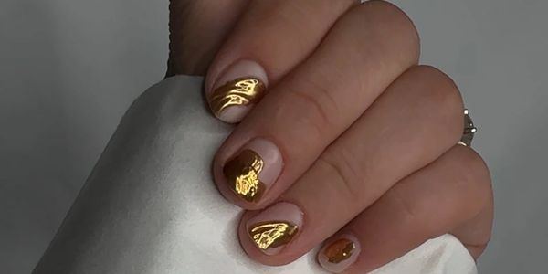 natural nails gold jewel design on top of nude pink matte. simple yet elegant nail design DTLA 