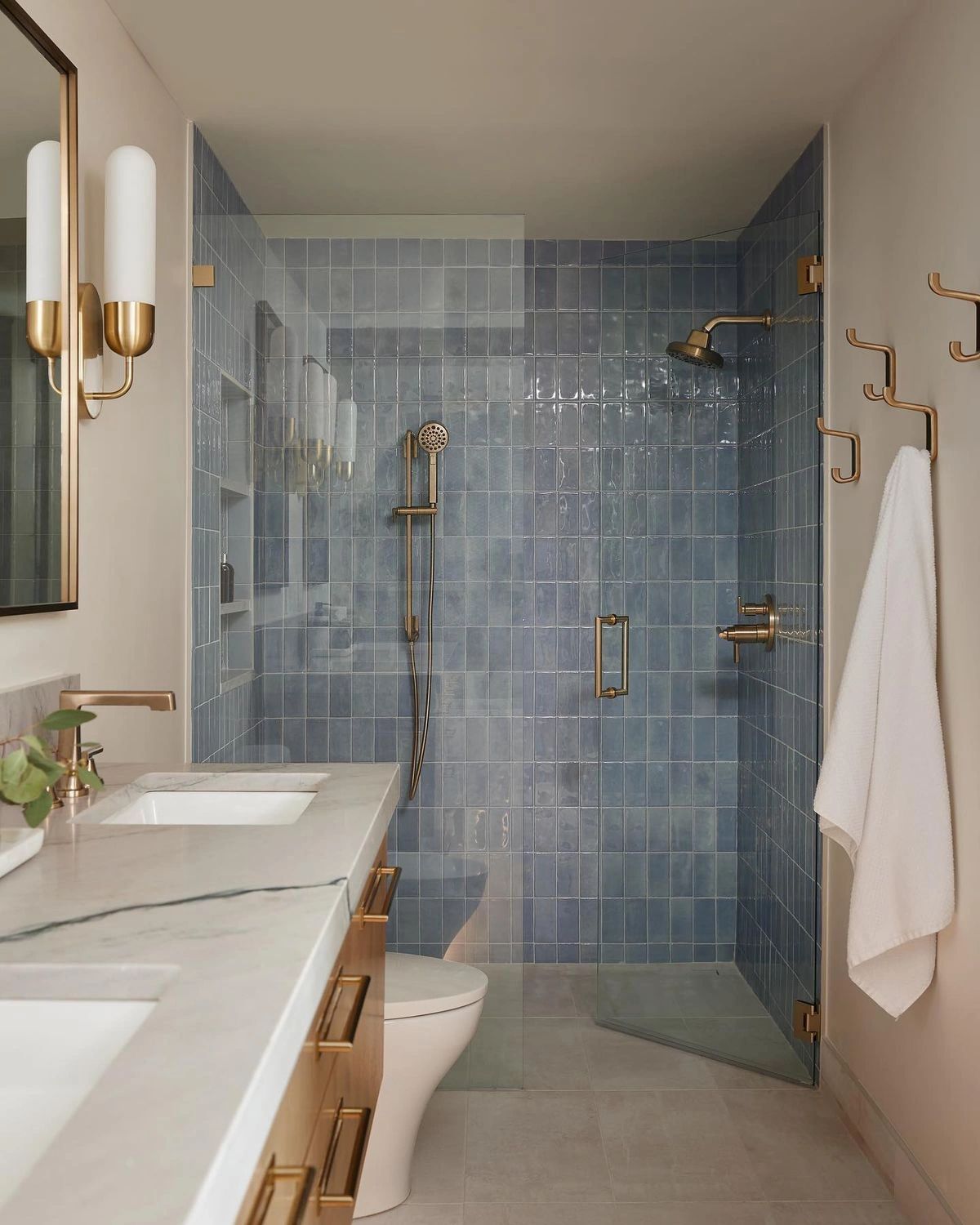 Blue shower tile bathroom remodel