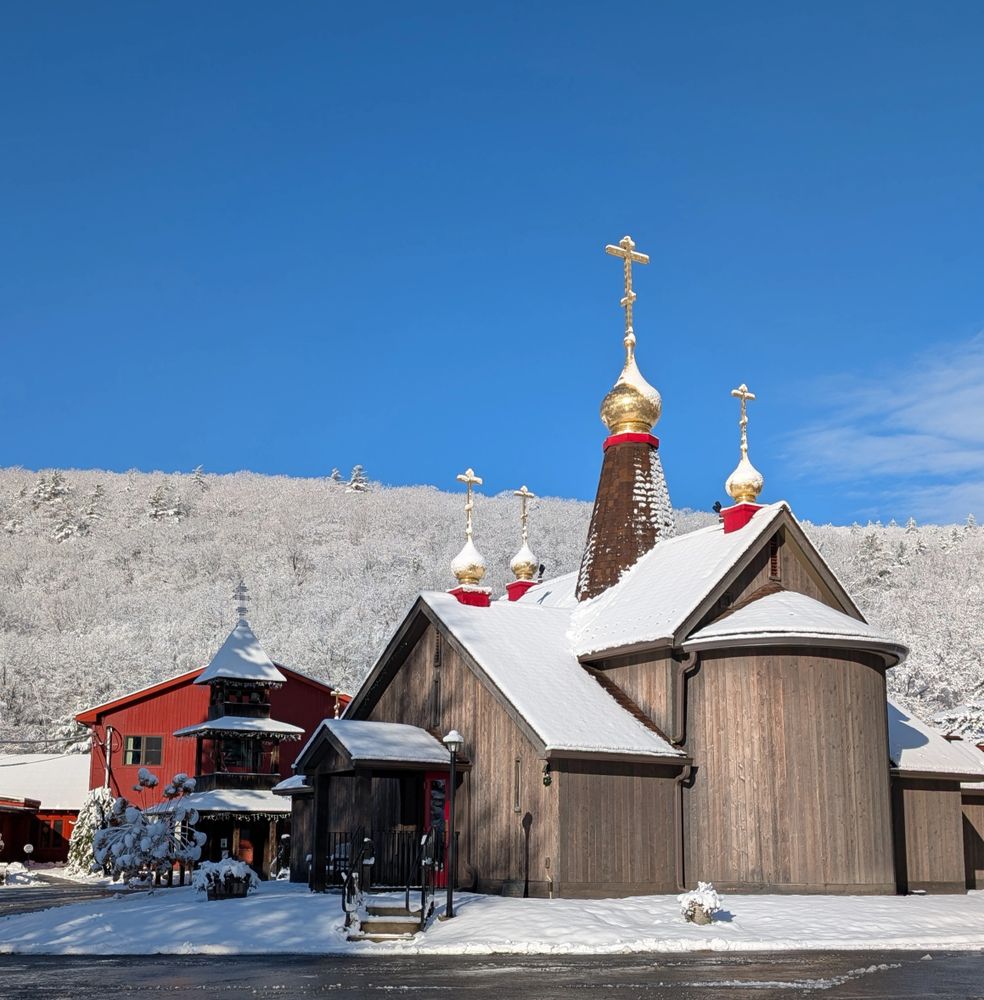 snow on church and trees