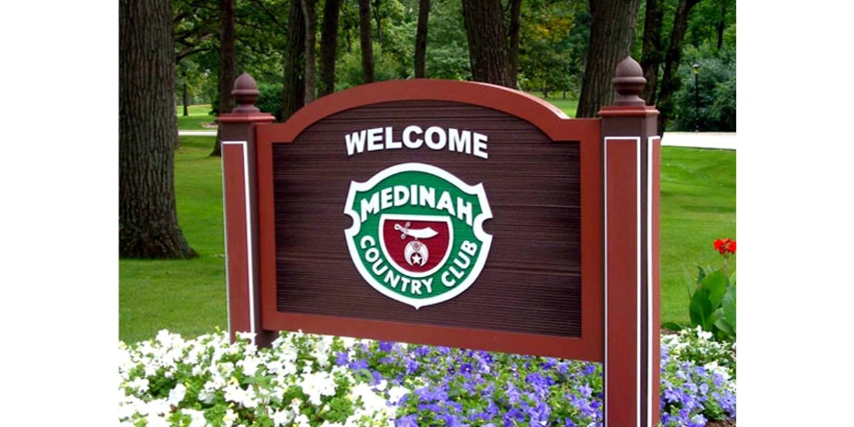Outdoor welcome sign for Medinah Country Club in Medinah, IL 60157. Homes for sale in Medinah, IL. R
