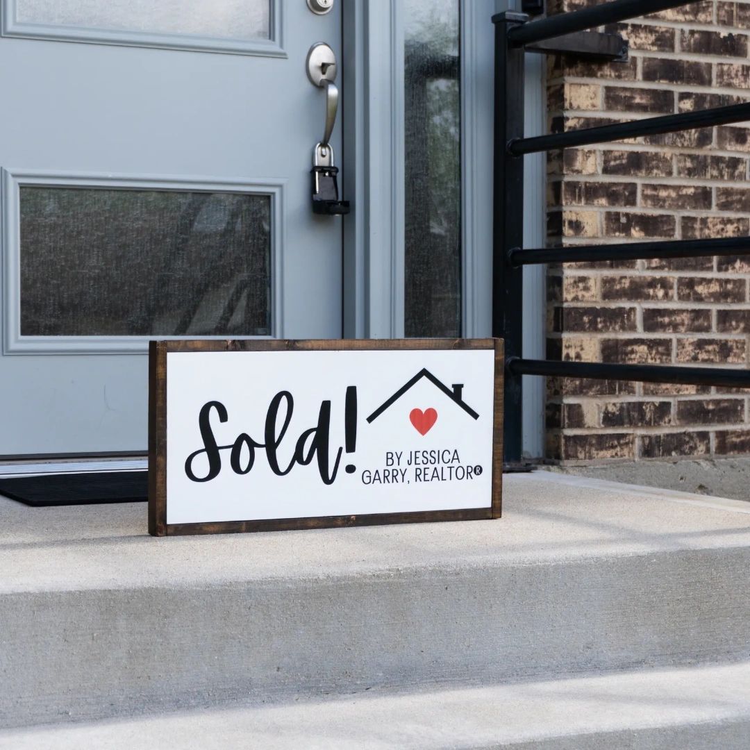 Garry Real Estate sold sign representing successful home purchases for buyers in Roselle, Illinois.