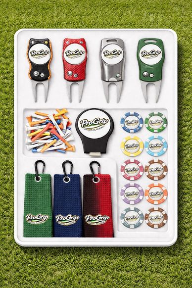 Golf accessory kit with divot tools, tees, markers, and ball markers.