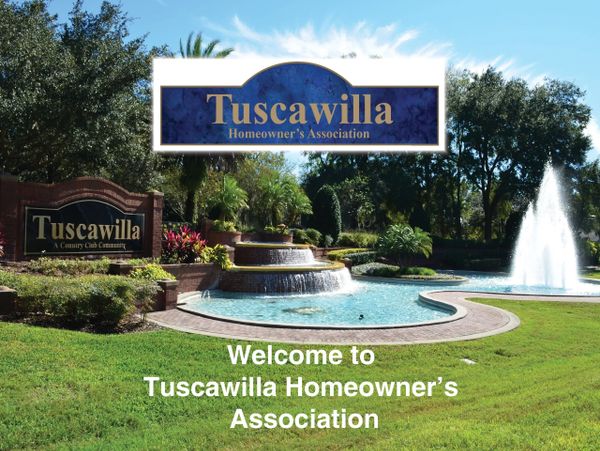 Entrance of Tuscawilla with a fountain and signage.