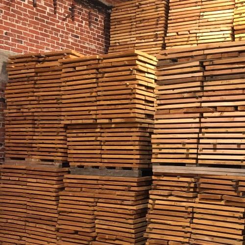 Stacks of pine for stave lumber core manufacturing 