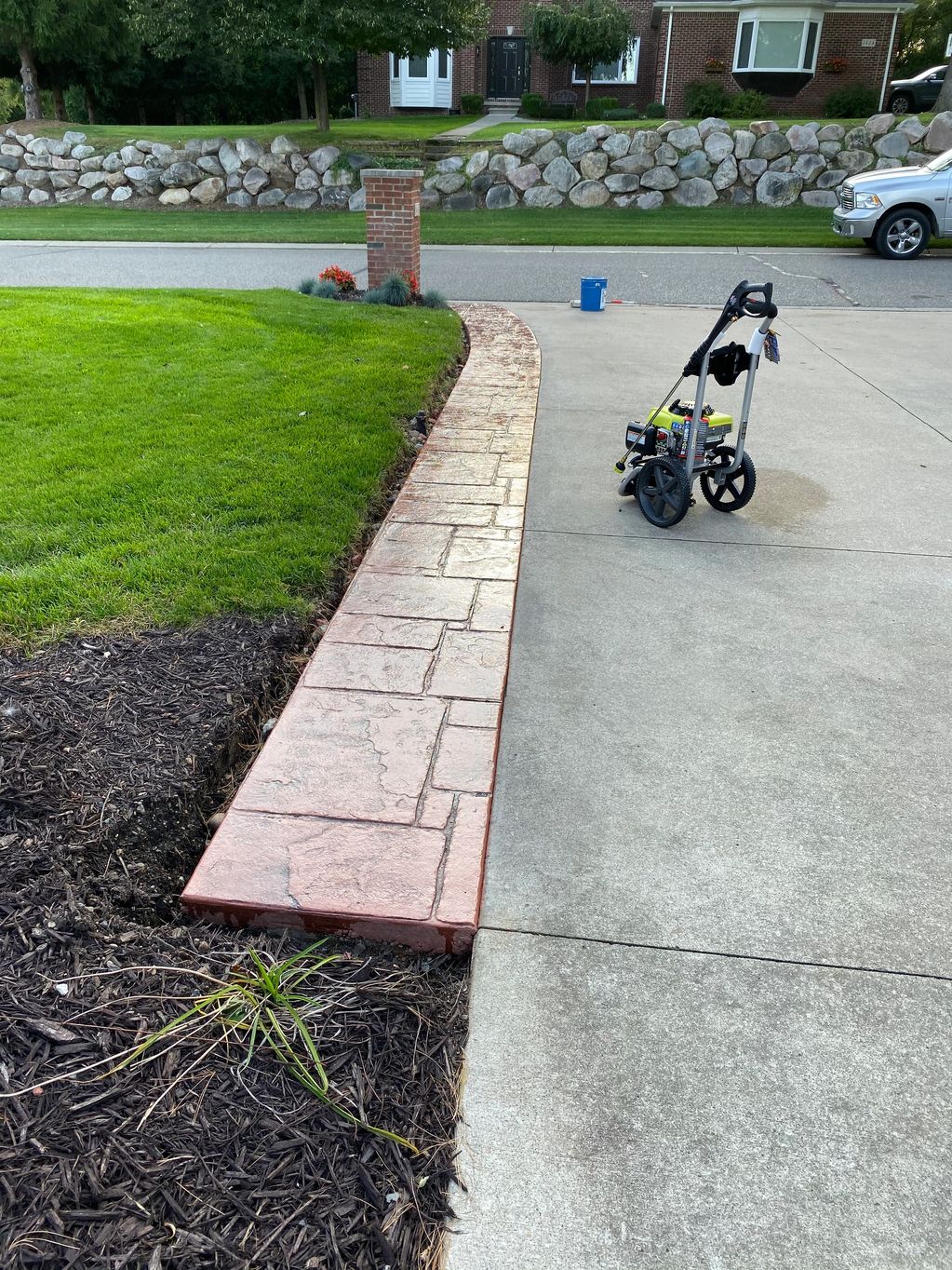 Stamped concrete driveway extension 