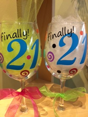 Two decorated glasses celebrating turning 21.