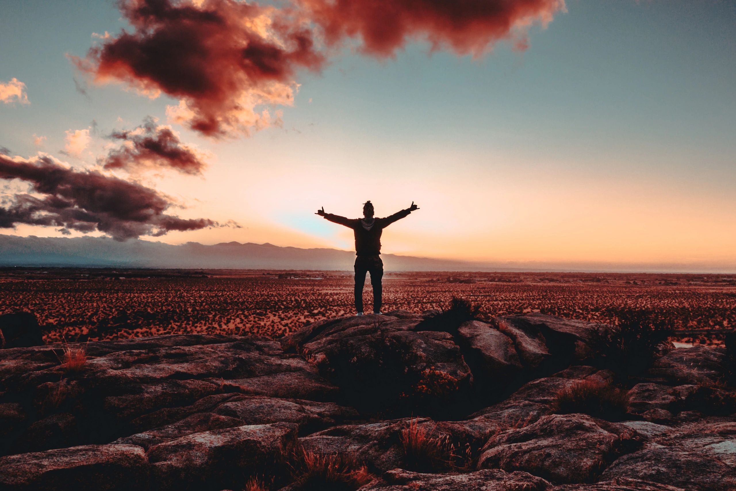 Man with arms outstretched 