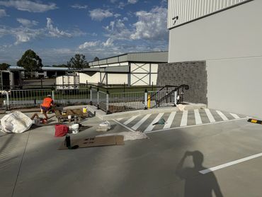 Construction work on a building's exterior area.