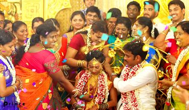 Traditional Indian wedding ceremony with bride, groom, and joyful guests.