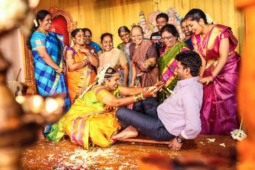 Candid fun family moment at traditional Tamil wedding in Thanjavur by Luster Pearl Media.