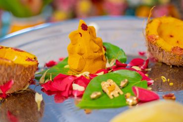 Turmeric Ganesha for traditional Tamil wedding rituals in Thanjavur by Luster Pearl Media.