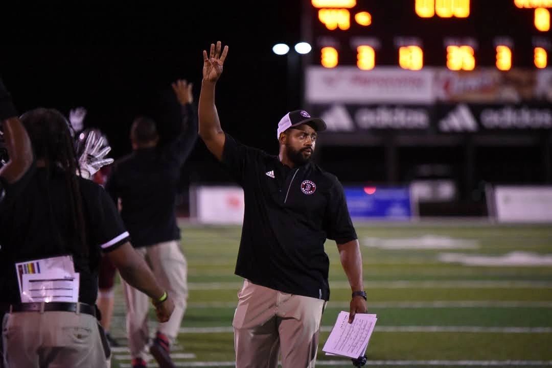 Coach Adrian J. Morton