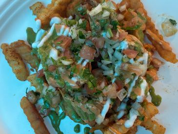 WAH LOADED FRIES
French fries covered in Masala, with the possible addition of various other toppings including samosas, proteins and loads of love!
