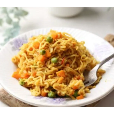 WAH MAGGIE - Maggi noodles are a popular snack in India that are slightly salty and saucy, with seasonings like masala and tomato.