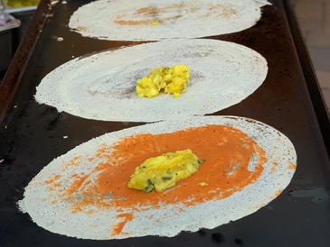 WAH LIVE DOSA
Dosa is a savory, thin crepe that originated in South India and is made from fermented rice and lentil batter. Its best when made live and served hot!