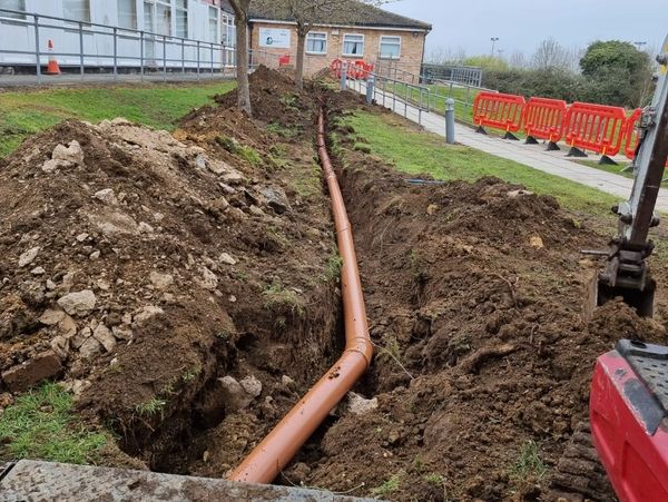 Pipe being placed underground