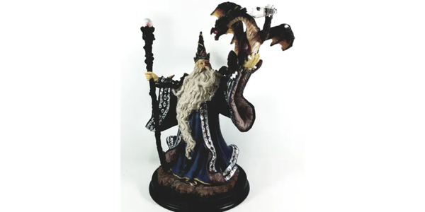 Wizard with dragon holding his staff