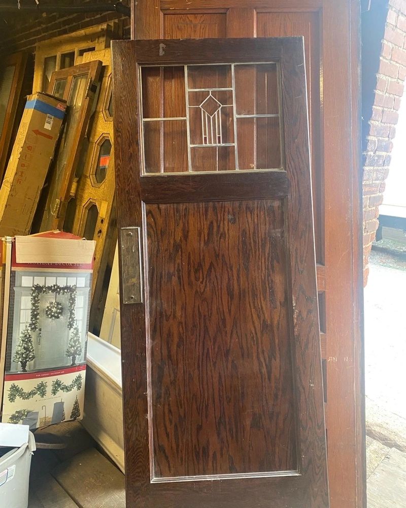 Nice arts and crafts butlers pantry door. double swing pivot hardware