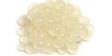 A pile of small, translucent, white spheres.

