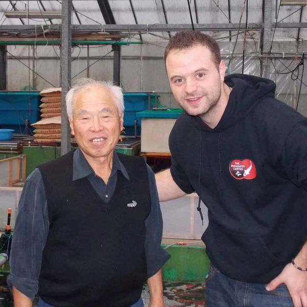 Picture of Julian with the owner of Shinoda koi farm in Niigata, Japan. 