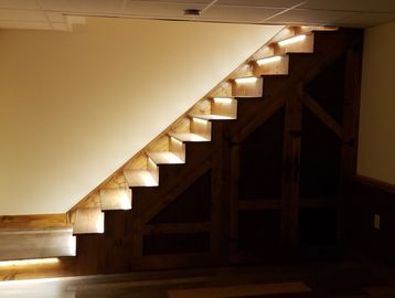 Lighted finished basement stairs