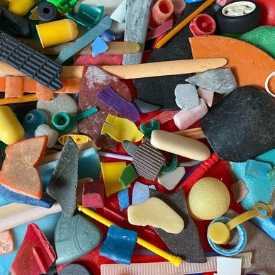 Collectiom of colourful plastic found washed up on the beach