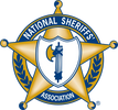 Emblem of the National Sheriffs' Association featuring a shield and crossed swords.