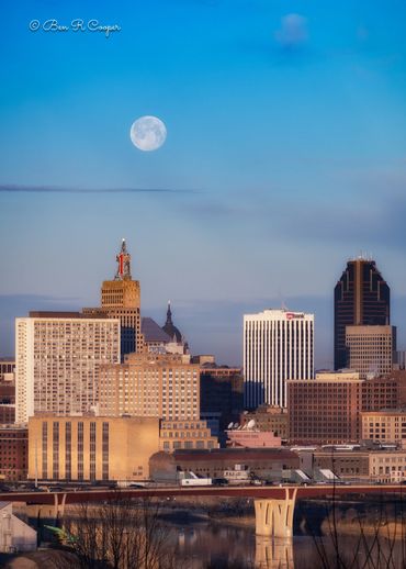 Full moon over Saint Paul, MN directly over the First Bank building and the St. Paul cathedral