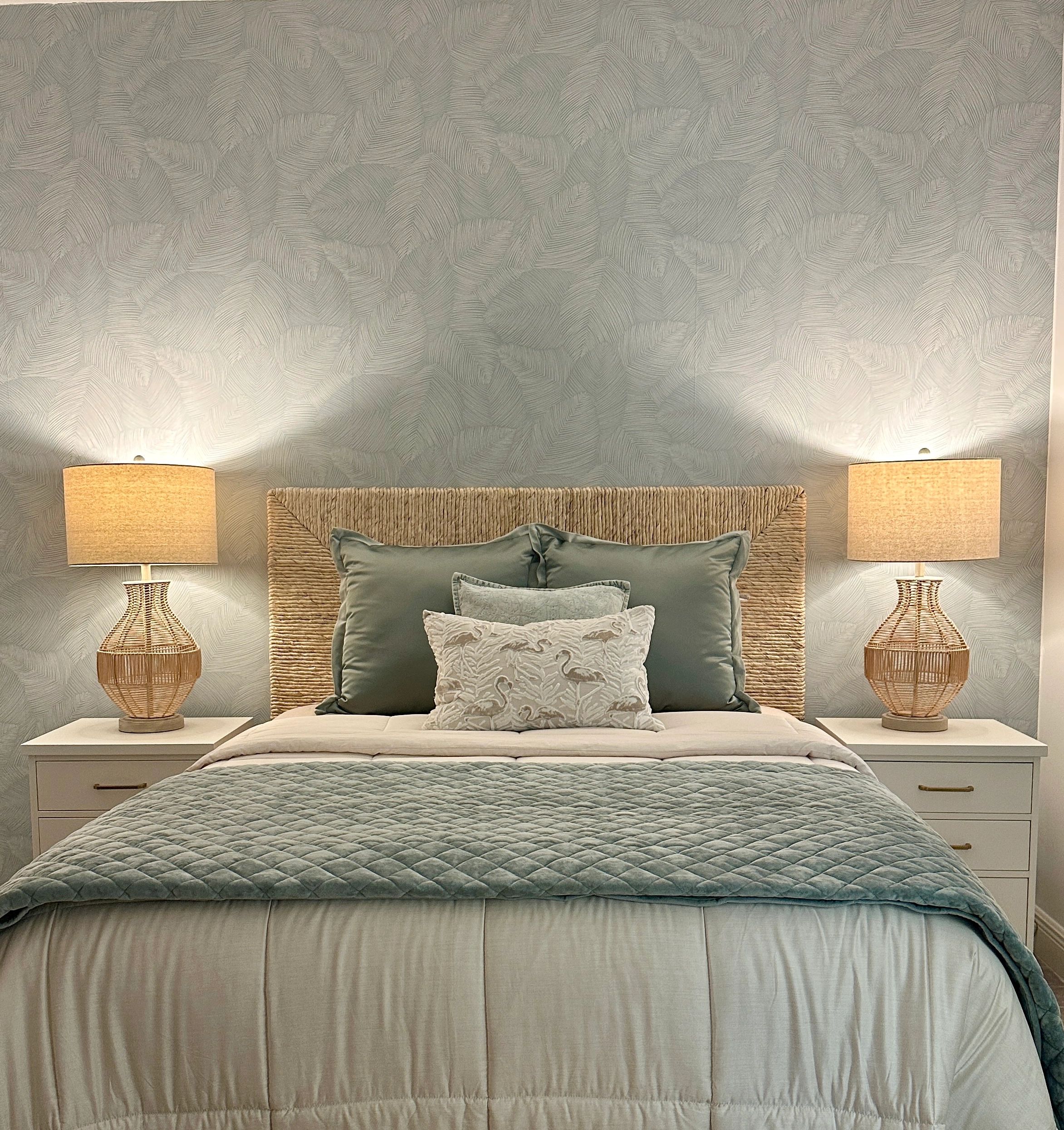 Repainted and installed new hardware on nightstands, selected wallpaper, lamps, headboard and beddin