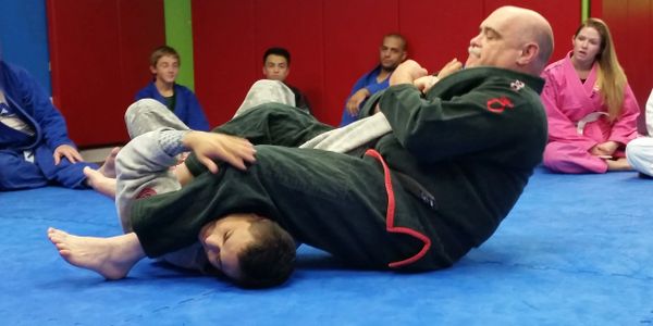 Allen J. Sachetti takes an armlock