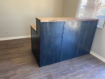 black metal desk with wooden butcherblock top