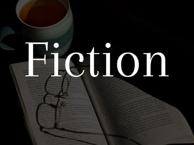 Text "fiction" appears over book, teacup and glasses.