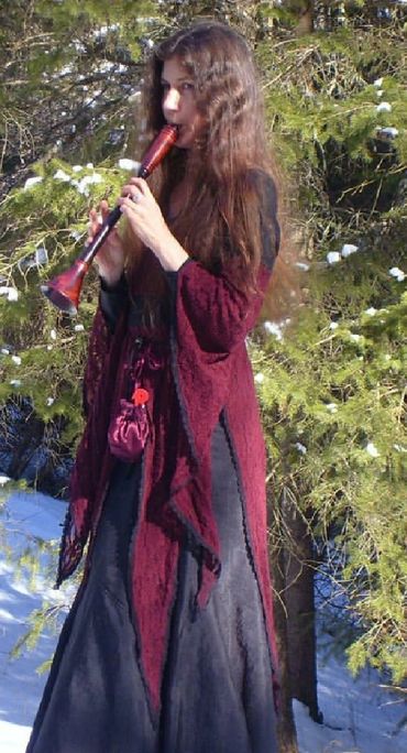 Heather from Medieval/Fantasy Folk/Rock band Elflore in the winter playing Raushpfeife.
